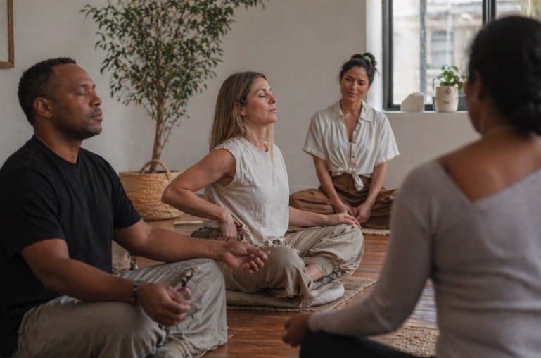 meditation guide observing participants during a session meditation guide observing participants during a session